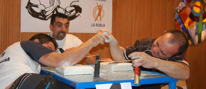Camilo Vega y Ral Fernndez, campeones del Open Nacional de Lucha de Brazos de Len